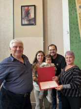 Graduate scholar J.C,her family are with Aygunduzs
