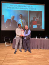 Mr Aygunduz presented plaque to Mr.H.Y
