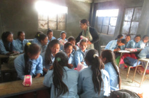 Outreach participants receive sanitary pads.
