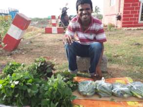 Basuvaraj selling fresh greens