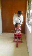 Sudharshan with his physiotherapist
