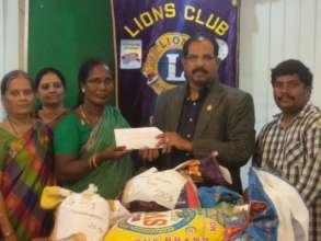 Raising rice for distribution to poor homes