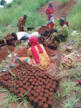Farmers from the Kihamira Group sowing seeds