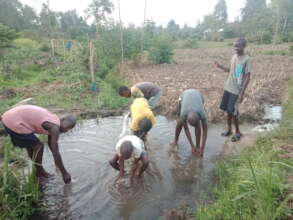 Rural Kenya drinking contaminated water
