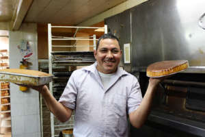 Jose with his famous pastel de queso!