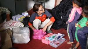 Anamica attracts attention as she repacks supplies