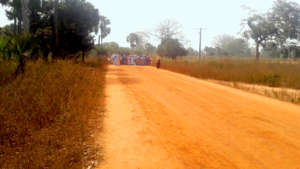 Women approach Djimande to lead the 12/28 rituals