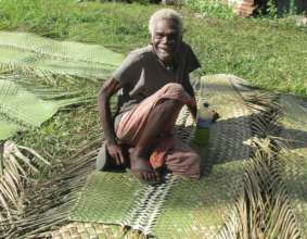 Tanna Elder on Woven Coconut Mats