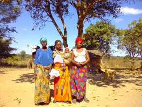 Sakami M. with her child, mother and grandmother