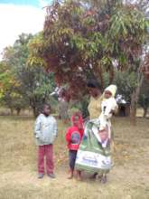 Thandi with her children on their farm
