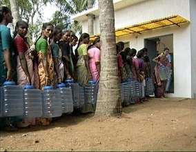 Villagers waiting for purified water collection