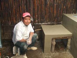 A mason constructing a stove