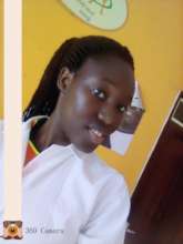 Help Harriet complete her nursing course in Uganda