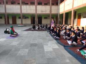 Yoga Session with young girls in Primary School