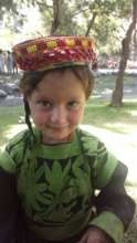 KALASH child in their traditional attire