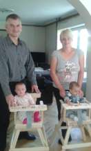 Mile visiting babies sitting in his chairs.