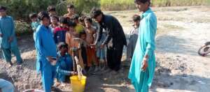 Hand pump in new village