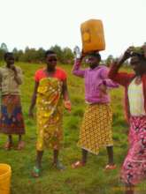 Women carry drinking water from 1 to 2 km away