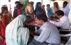 Dr. Abhijeet Baradwaj examining patient