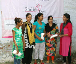 Girls receiving sanitary napkins
