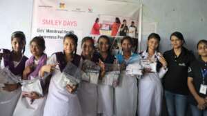 Girls with Smiley Days Team during MHM session