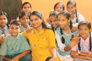 Project lead Ms. Jyoti Singh with Smiley Days girl