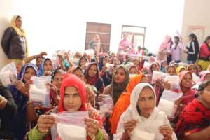 Women with menstrual hygiene kit