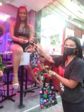 Woman receiving gift bag