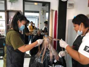 The two women that returned from Hair School