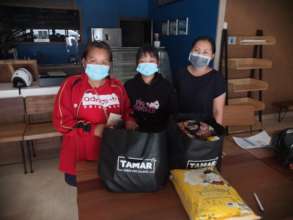 Former Tamar woman receive food packages