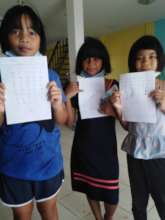 Children doing their homeschooling