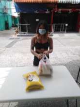 Women receiving food bags