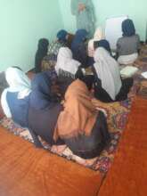 Girls continue learning together.