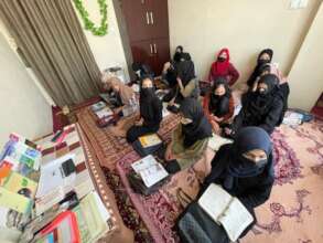 Girls receiving education in our home-based school