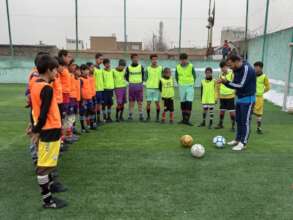 Football Trainer and the street working children