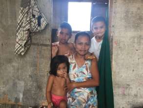 Happy solar lamp beneficiary