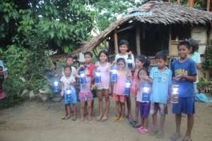 Children with their solar lamps