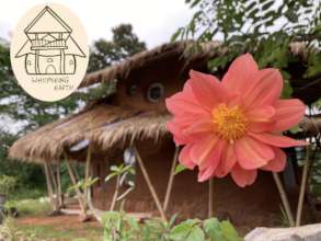 Whispering Earth's newest building & new logo
