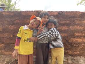 Little ones enjoying building in the mud!