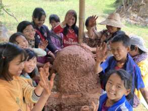 Building our first mud brick bread oven with kids