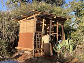 Framing of compost toilet and first layers of mud