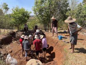 Learning adobe brick making