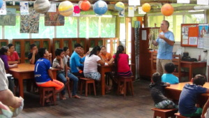 Jose inspiring kids at the library to play music