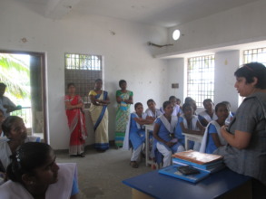 Mrs. Nishka Crishna, with student and teachers