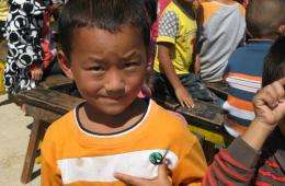 Child with badge