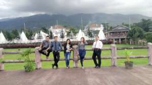 Dimas and his colleagues at work.