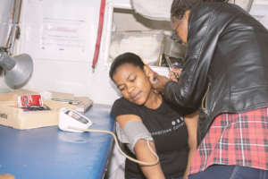 Tema attending to a patient