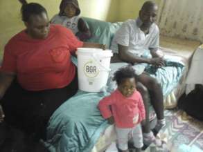 Mr M and his family at home
