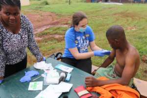 Dr Hunter removing a putsi fly larvae