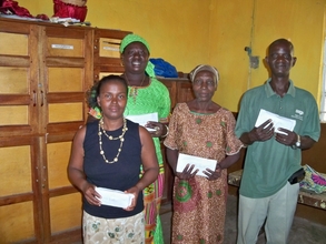 Peter and other microfinance beneficiaries